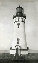 Black and white photo of conical lighthouse with black upper stories.
